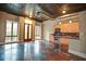 Spacious living room featuring modern kitchen, stained concrete floors and multiple windows with city views at 123 Luckie Nw St # 2510, Atlanta, GA 30303