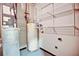 This utility room offers ample storage with white wire shelving and painted concrete floor at 123 Luckie Nw St # 2510, Atlanta, GA 30303