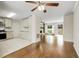 Open-concept living room with hardwood floors, and a view into the kitchen at 4575 Jamerson Forest Pkwy, Marietta, GA 30066