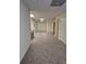 Spacious basement area with neutral carpeting at 755 Creek Wind Ct, Johns Creek, GA 30097