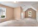 Bonus room with neutral walls, carpet, and two windows offering ample natural light at 755 Creek Wind Ct, Johns Creek, GA 30097