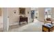 Inviting foyer with beautiful furnishings and an open view to the entry at 755 Creek Wind Ct, Johns Creek, GA 30097