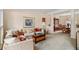 Spacious living room with comfortable seating, elegant decor, and open floor plan at 755 Creek Wind Ct, Johns Creek, GA 30097