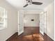 Light-filled bedroom offering hardwood floors, ceiling fan, and an inviting doorway at 1526 Stone Gate Se Ln, Atlanta, GA 30317