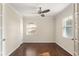 Bright and airy bedroom featuring hardwood floors, ceiling fan and abundant natural light at 1526 Stone Gate Se Ln, Atlanta, GA 30317