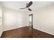 Clean bedroom space featuring hardwood floors, ceiling fan, and neutral color palette at 1526 Stone Gate Se Ln, Atlanta, GA 30317