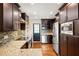 Modern kitchen featuring stainless steel appliances, granite countertops, and stylish backsplash at 1526 Stone Gate Se Ln, Atlanta, GA 30317