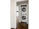 Conveniently stacked washer and dryer are discreetly tucked away behind doors at 1526 Stone Gate Se Ln, Atlanta, GA 30317