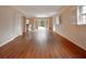 Bright living room features hardwood floors and natural light from french doors at 1728 Stonecliff Ct, Decatur, GA 30033