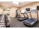 Well-equipped gym with treadmills, weights, and mirrored wall at 3280 Stillhouse Se Ln # 108, Atlanta, GA 30339