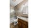 Bathroom with a granite countertop vanity, tub with shower and tiled wall at 4481 Windsor Oaks Dr, Marietta, GA 30066