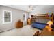 Cozy bedroom with built-in bunk beds, natural light, and classic wooden furniture at 4481 Windsor Oaks Dr, Marietta, GA 30066