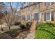 Brick home featuring a beautifully landscaped front yard and an inviting entryway at 4481 Windsor Oaks Dr, Marietta, GA 30066