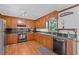 Well-lit kitchen featuring stainless steel appliances, and ample wooden cabinetry at 4481 Windsor Oaks Dr, Marietta, GA 30066