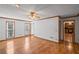 Inviting living room features hardwood floors, neutral walls, and windows for natural light at 4481 Windsor Oaks Dr, Marietta, GA 30066