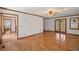 Large living room with hardwood floors, wood trim and a brick fireplace at 4481 Windsor Oaks Dr, Marietta, GA 30066