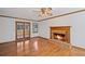 Cozy living room features hardwood floors, fireplace and french doors at 4481 Windsor Oaks Dr, Marietta, GA 30066