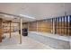 Enclosed patio with concrete block privacy wall and fluorescent lighting provides a flexible outdoor space at 4481 Windsor Oaks Dr, Marietta, GA 30066