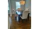 Dining room with hardwood floors, chandelier, and comfortable seating at 818 Burchill Sw St, Atlanta, GA 30310