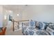 Small bedroom featuring a trundle bed next to a small white staircase at 108 Trailside Cir, Hiram, GA 30141