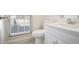 Bathroom with white vanity and a window at 275 Carriage Chase, Fayetteville, GA 30214