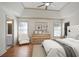 Main bedroom featuring a trey ceiling, hardwood floors, and a lovely ensuite at 275 Carriage Chase, Fayetteville, GA 30214