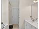 Bathroom view showcasing a single sink vanity with a view of shower room and bath tub at 49 Inverness Ct, Hiram, GA 30141
