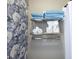 Bathroom wall with shelves holding towels at 49 Inverness Ct, Hiram, GA 30141