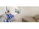 Spacious bonus room featuring an sitting area with a couch, chaise, and gym equipment at 49 Inverness Ct, Hiram, GA 30141