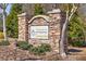 Stone sign for Orchards at Creekside community at 49 Inverness Ct, Hiram, GA 30141