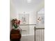 Upstairs hallway with carpet and view into a bedroom at 49 Inverness Ct, Hiram, GA 30141