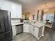 Kitchen with stainless steel appliances, granite counters, and an eat-in breakfast bar at 49 Inverness Ct, Hiram, GA 30141