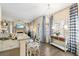 Open kitchen featuring a breakfast bar, granite countertops, and casual dining nook at 49 Inverness Ct, Hiram, GA 30141