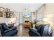 Inviting living room with a fireplace, ample seating, and neutral tones for a relaxing atmosphere at 49 Inverness Ct, Hiram, GA 30141