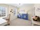 Bright office space with desk, shelves, storage bins, and large window at 49 Inverness Ct, Hiram, GA 30141