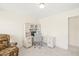 Inviting office space with built-in desk, drawers, hutch, and comfortable armchair at 49 Inverness Ct, Hiram, GA 30141