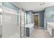 Bathroom showcasing a glass-enclosed shower and soaking tub at 6005 Pattingham Dr, Roswell, GA 30075