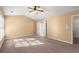 Spacious bedroom with two large windows and vaulted ceiling at 6005 Pattingham Dr, Roswell, GA 30075