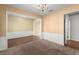 Open living area with hardwood floors, and neutral colored walls at 6005 Pattingham Dr, Roswell, GA 30075