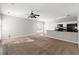 Spacious living room flowing into the kitchen, offering a modern and open layout at 6005 Pattingham Dr, Roswell, GA 30075