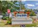 Welcome to Spring Harbor! Community sign surrounded by shrubs and trees at 4008 Bayside Cir, Atlanta, GA 30340