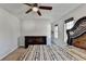 Comfortable main bedroom featuring a decorative bed frame, ceiling fan, and natural light at 4008 Bayside Cir, Atlanta, GA 30340