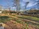 Picture of a spacious backyard featuring a wooden fence and a storage shed at 43 Landmark Sw Ln, Marietta, GA 30060