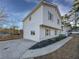 Corner lot home with a landscaped yard and a long driveway at 43 Landmark Sw Ln, Marietta, GA 30060