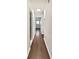 Hallway showcasing hardwood floors connecting various areas of the home at 43 Landmark Sw Ln, Marietta, GA 30060