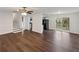 Bright living room with hardwood floors and a sliding glass door to the outdoor patio at 43 Landmark Sw Ln, Marietta, GA 30060