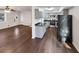 Open-concept living room and kitchen with modern finishes and hardwood floors at 43 Landmark Sw Ln, Marietta, GA 30060