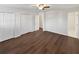 Spacious bedroom with hardwood floors, neutral walls and open closet space at 43 Landmark Sw Ln, Marietta, GA 30060