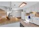 Bright, functional kitchen with butcher block counters, white cabinetry, and modern appliances at 1006 Walnut Dr, Lawrenceville, GA 30044