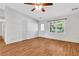 Open living room with hardwood floors, neutral paint, and abundant natural light, providing a versatile space for relaxation at 1006 Walnut Dr, Lawrenceville, GA 30044